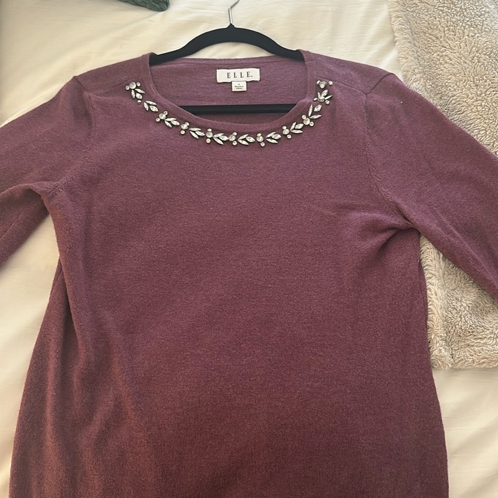 Beutiful purple sweater with neck detailing